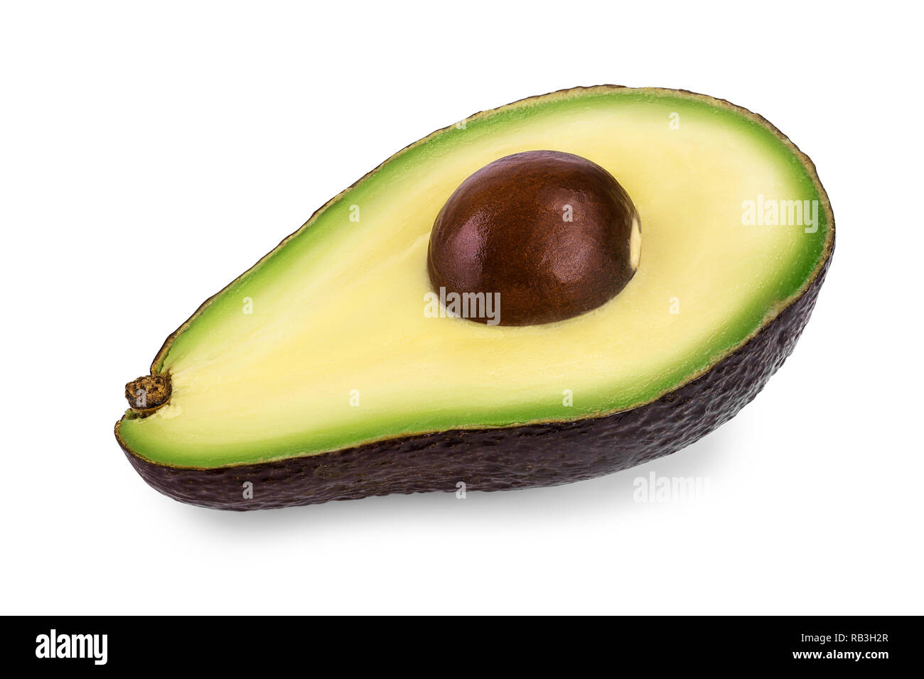 Avocado a metà isolato su sfondo bianco close up Foto Stock