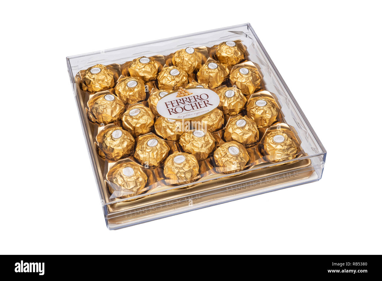 Scatola di Ferrero Rocher cioccolatini, nella loro presentazione in plastica scatola e involucri di oro. Foto Stock