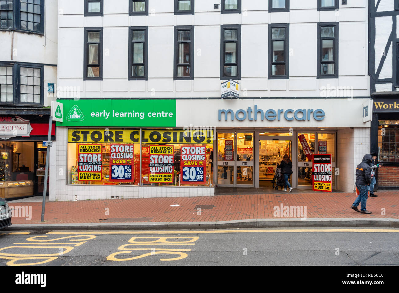 La I Mothercare e Early Learning Centre store in Reeading, Berkshire è avente una chiusura di vendita. Foto Stock