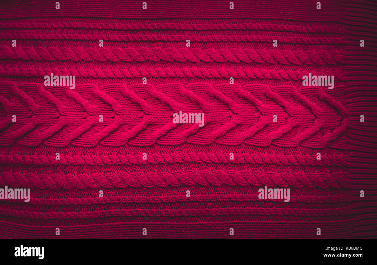 Rosa viola magenta maglia maglione di lana texture vicino. Fatte a mano viola rosa magenta Lana per maglieria sfondo texture Foto Stock