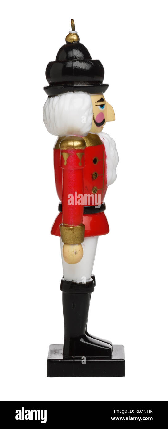 Profilo laterale di una decorazione ornamento di Natale di un dritto di fronte soldato carattere in un vestito rosso Foto Stock