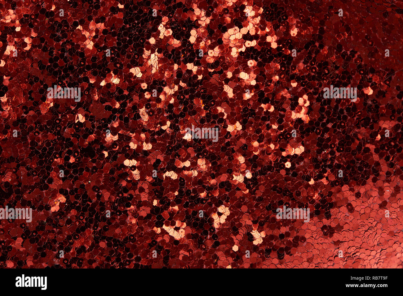 Shiny sparkle glitter sfondo. Red xmas texture Foto Stock