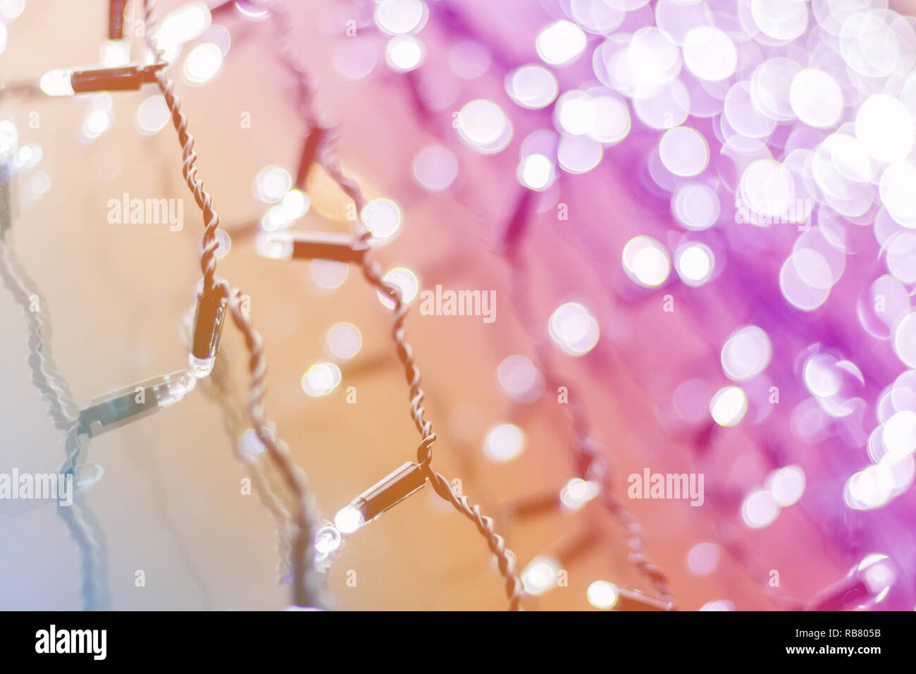 Nuovo anno incandescente garland con bokeh di fondo Foto Stock