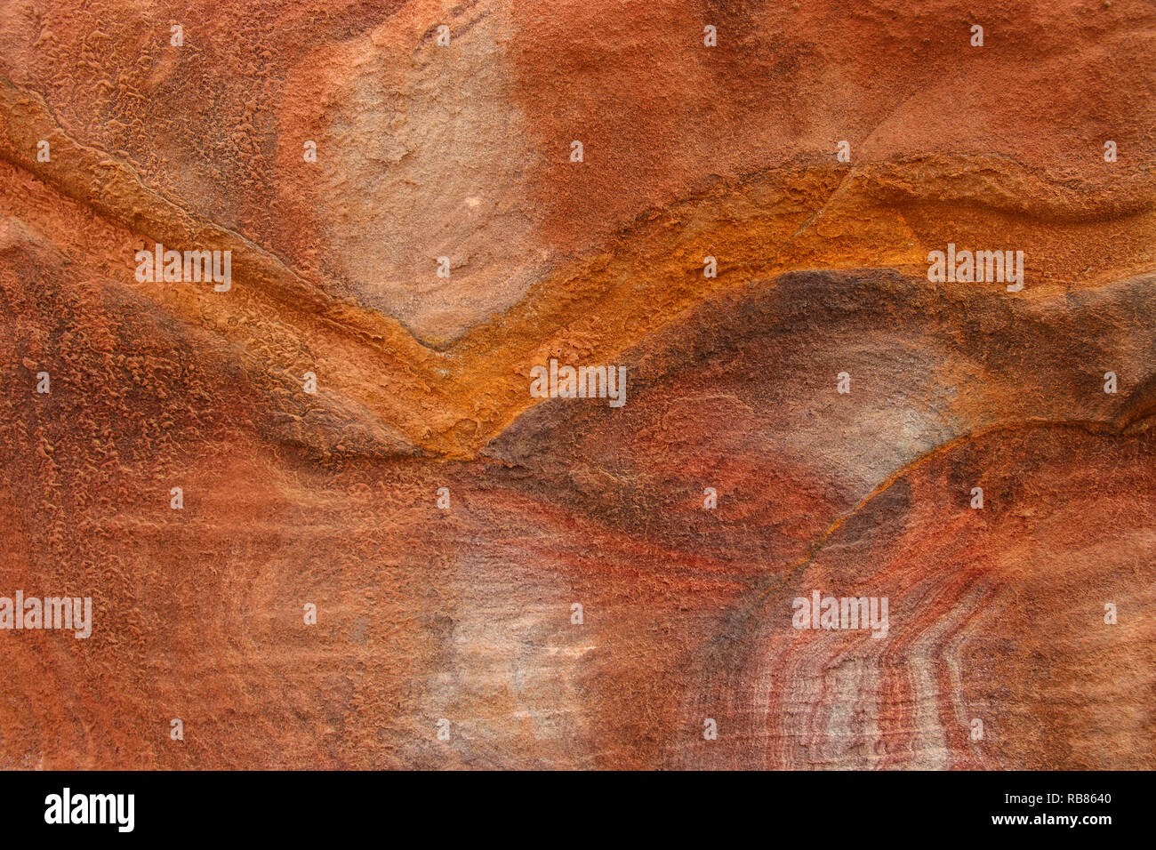 Abstract pattern colorati forra di arenaria Siq,Città Rosa, Petra, Giordania. Rosso pareti del canyon creare molti abstracts. Foto Stock