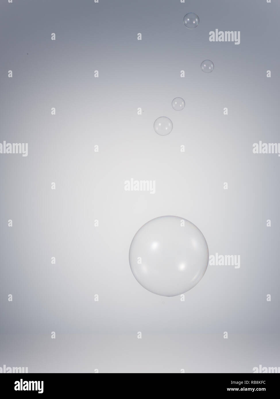 Bolle nel background di gradazione Foto Stock