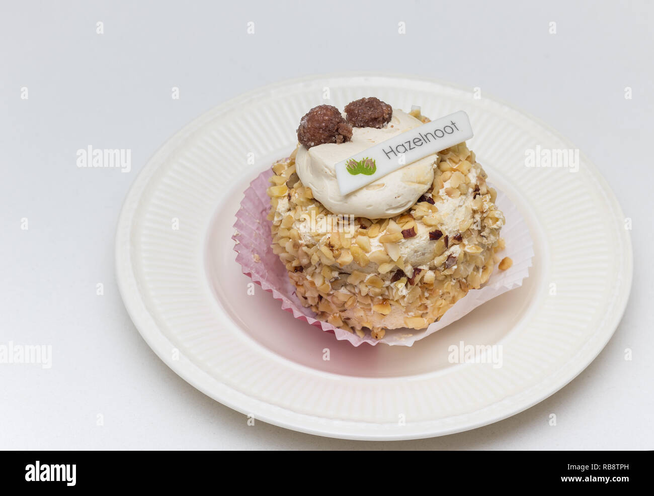 Tondo di pie, etichettato con la parola olandese per la nocciola Foto Stock