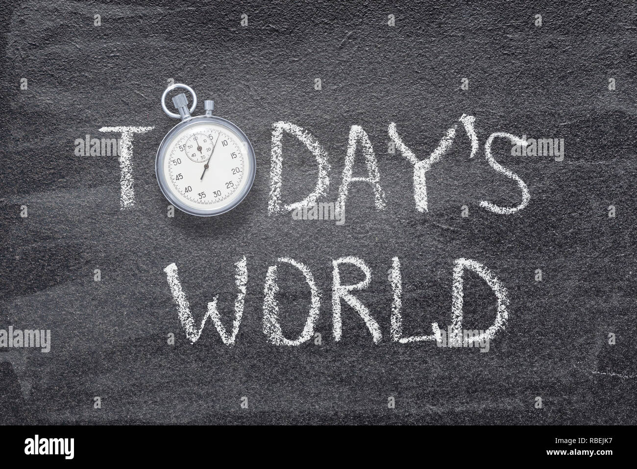 Il mondo di oggi una frase scritta sulla lavagna con vintage cronometro usati al posto di o Foto Stock