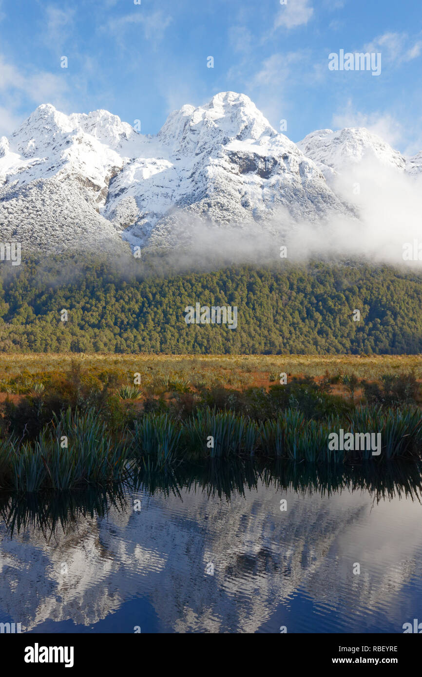 Tre Cime Cime riflesse nel lago Foto Stock