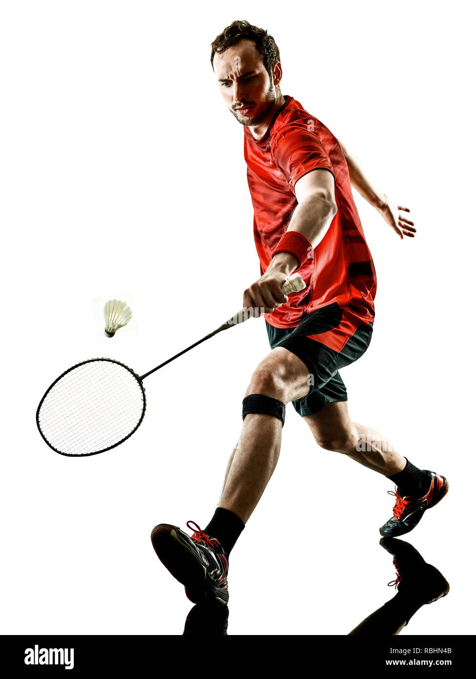 Un caucasian Badminton player uomo in studio ombra silhouette isolati su sfondo bianco Foto Stock