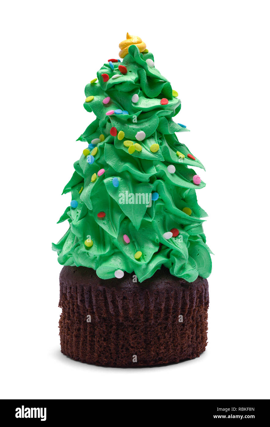 Tortina con la glassa verde albero di Natale isolato su sfondo bianco. Foto Stock