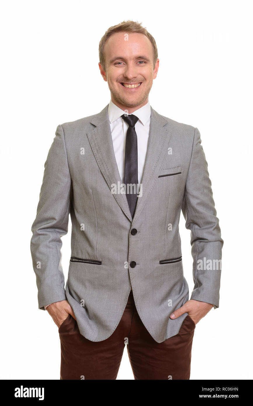 Felice bello imprenditore caucasica isolata contro uno sfondo bianco Foto Stock