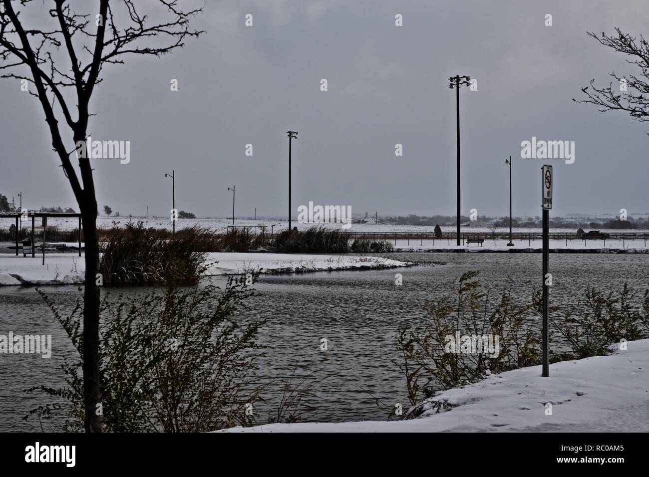 Tempesta di neve a Lindsey città pubblico Parco Lago di pesca, Canyon, Texas Foto Stock