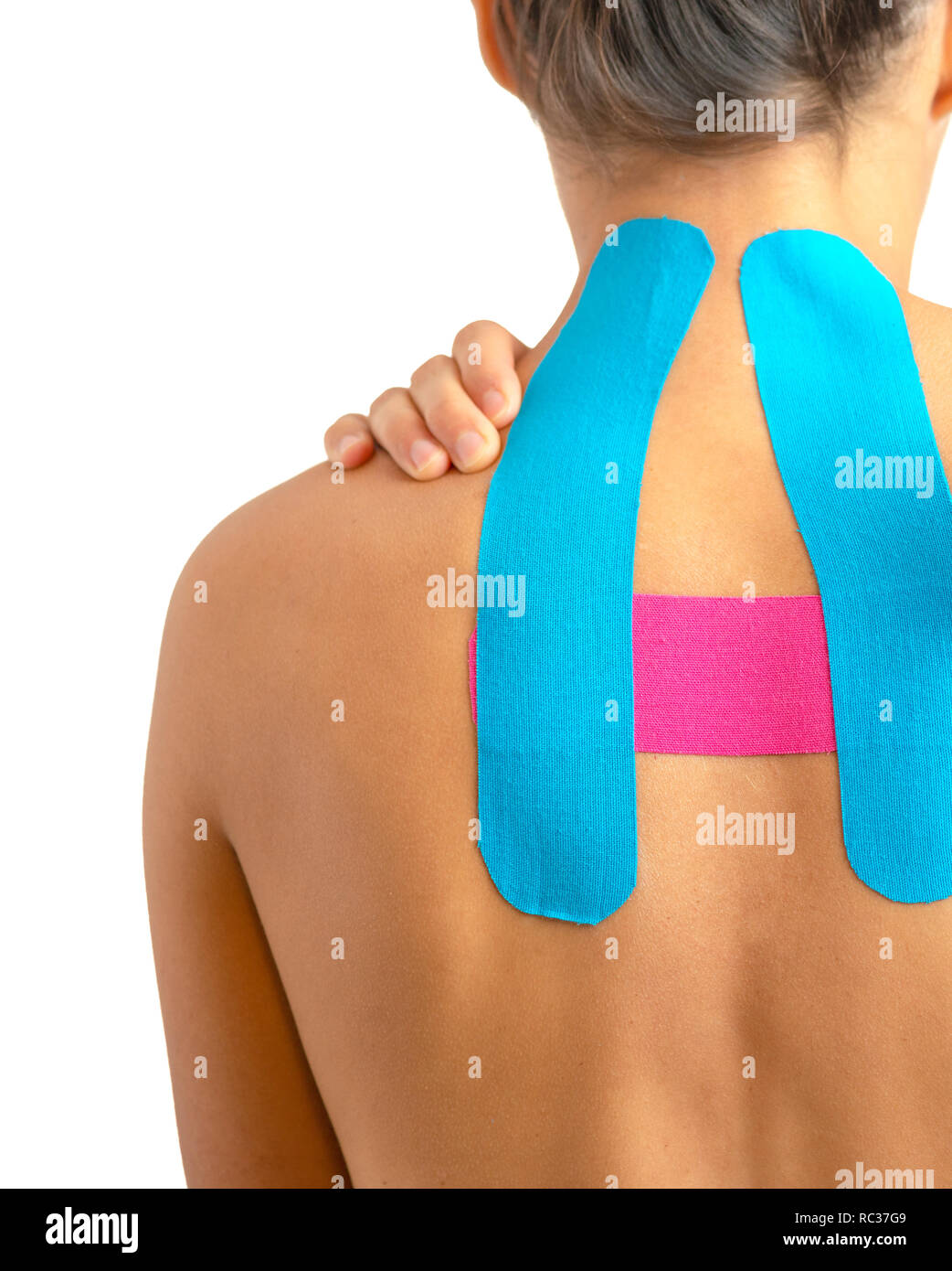 Indietro femmina con physio tape su sfondo bianco Foto Stock