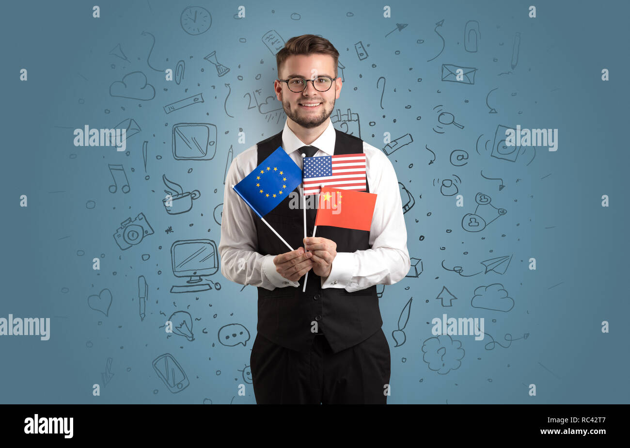 Imprenditore con ufficio concetto di simbolo e piccola bandiera sulla sua mano Foto Stock
