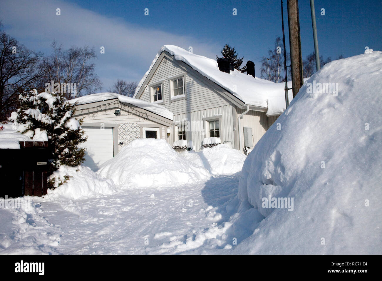 Casa nel paesaggio invernale Foto Stock