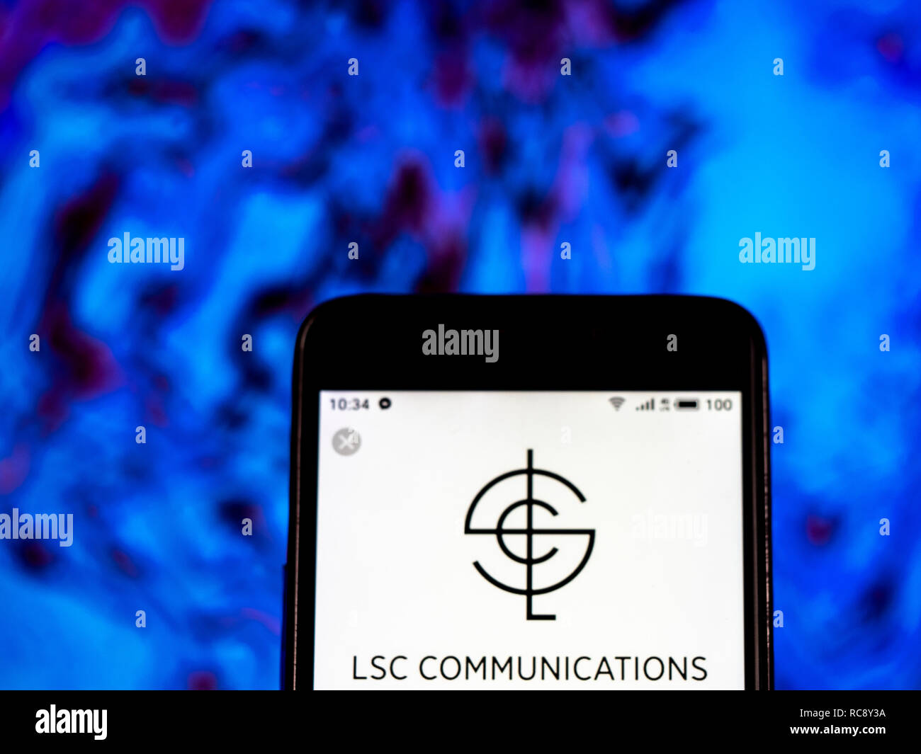 LSC Communications Printing Company logo che si vede visualizzato sul telefono intelligente. Foto Stock