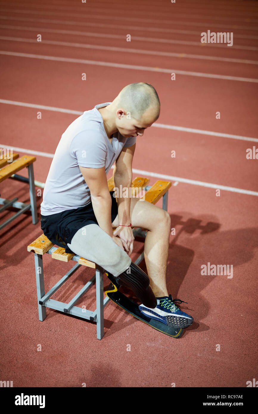Sportivo sul banco di lavoro Foto Stock