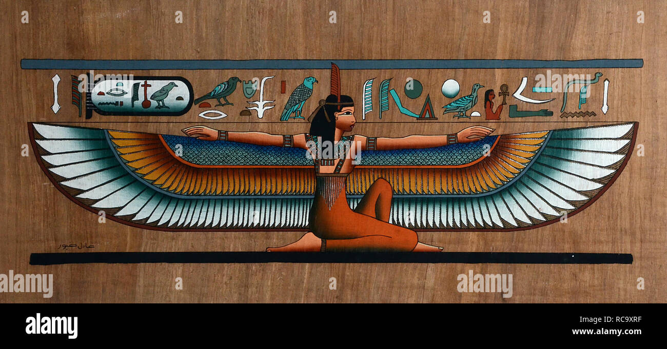 Papiro egiziano con dea alata Foto Stock