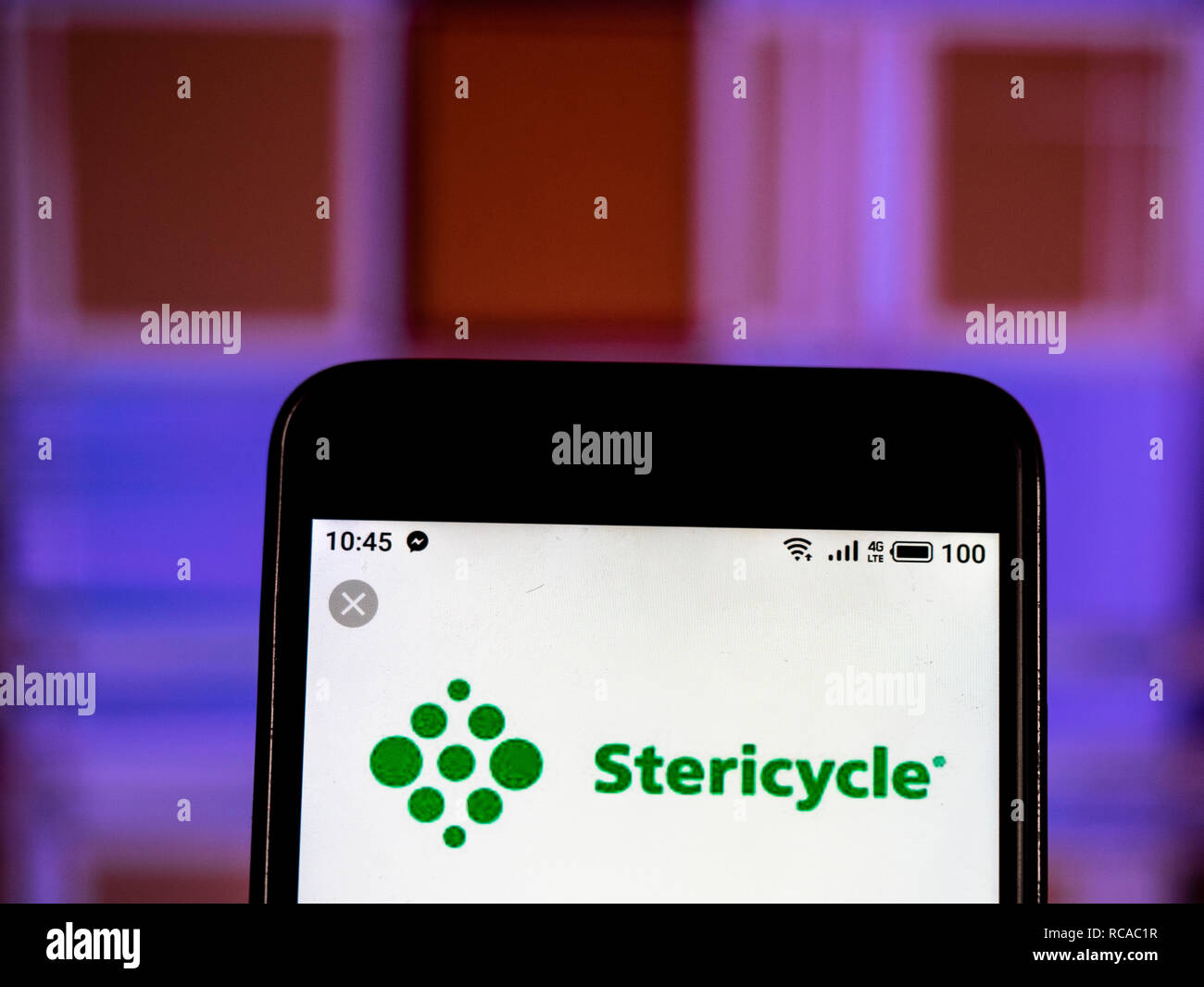 Stericycle logo azienda vede visualizzato sul telefono intelligente. Foto Stock