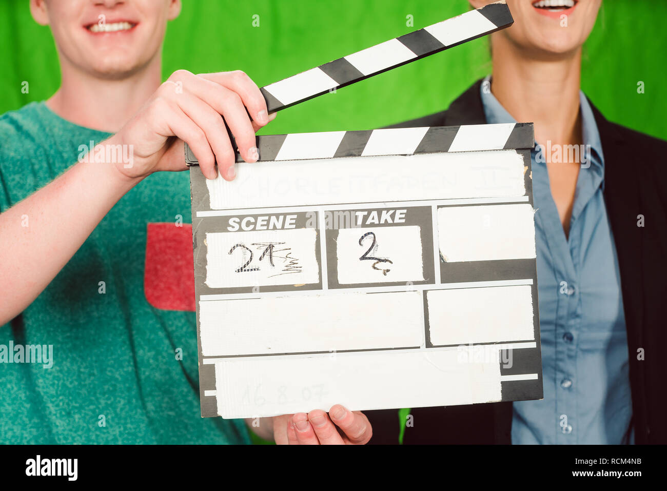 Assistant contiene il filmato in ardesia la fotocamera per avviare il prodotto Foto Stock