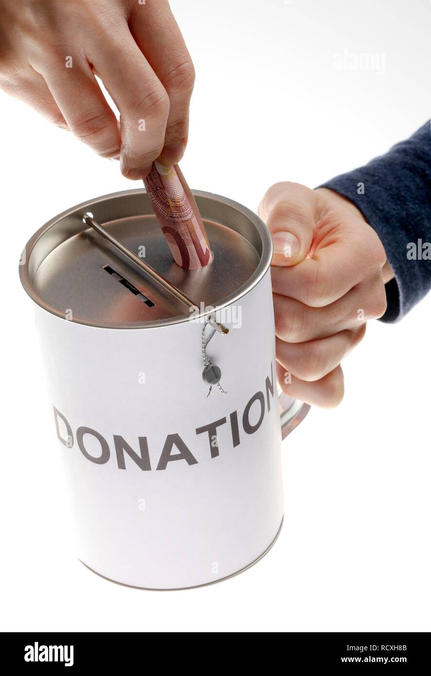 Le mani con una donazione box, denominata donazione Foto Stock
