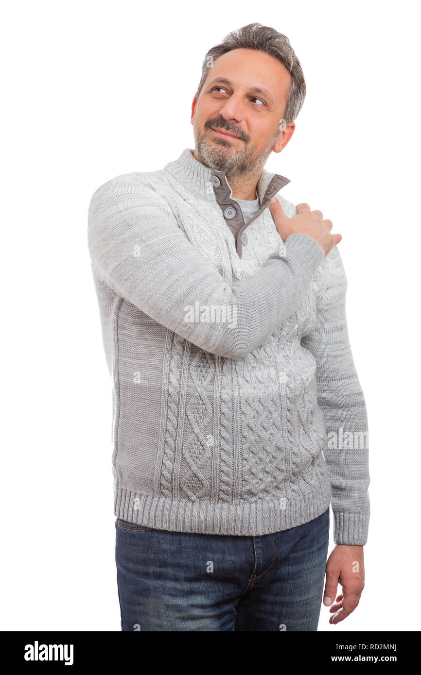 Uomo che indossa caldo maglione grigio e blu jeans spalla di toccare con  mano come ritratto concetto isolato su sfondo bianco Foto stock - Alamy