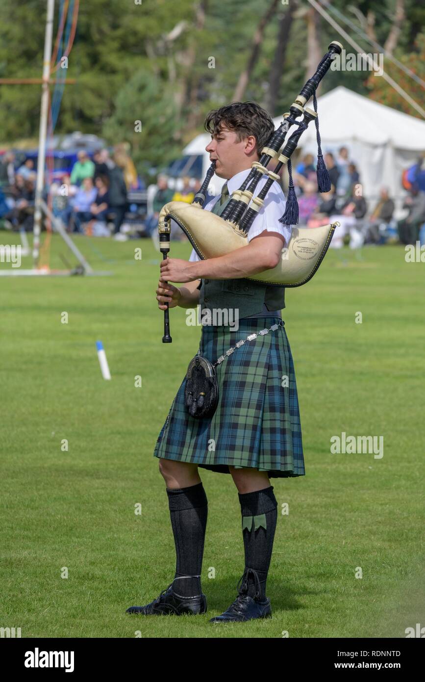 Bagpiper, Giochi delle Highland, Newtonmore, Scotland, Regno Unito Foto Stock