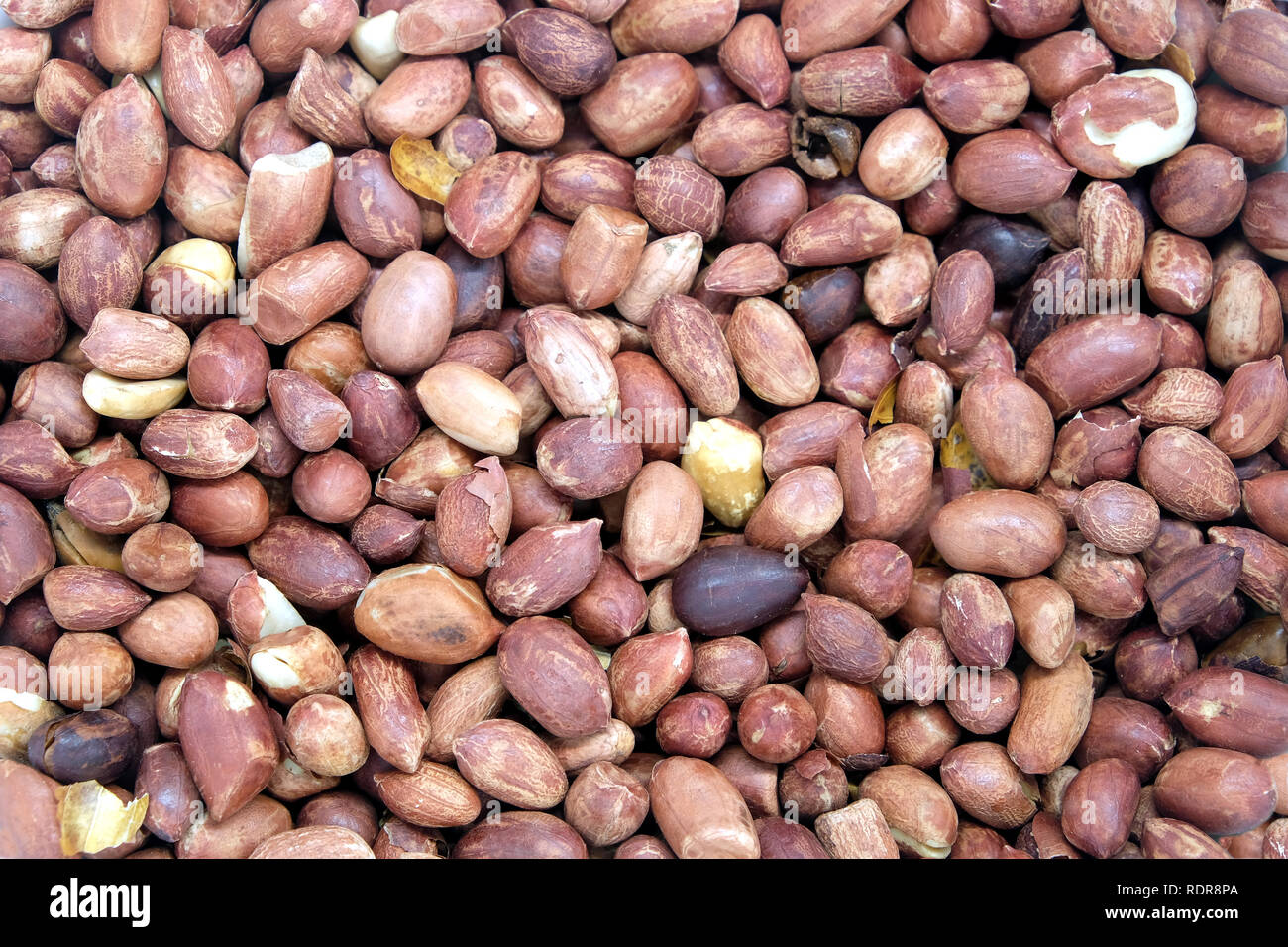 Sacco di arachidi tostate di frutta come sfondo vista superiore closeup Foto Stock