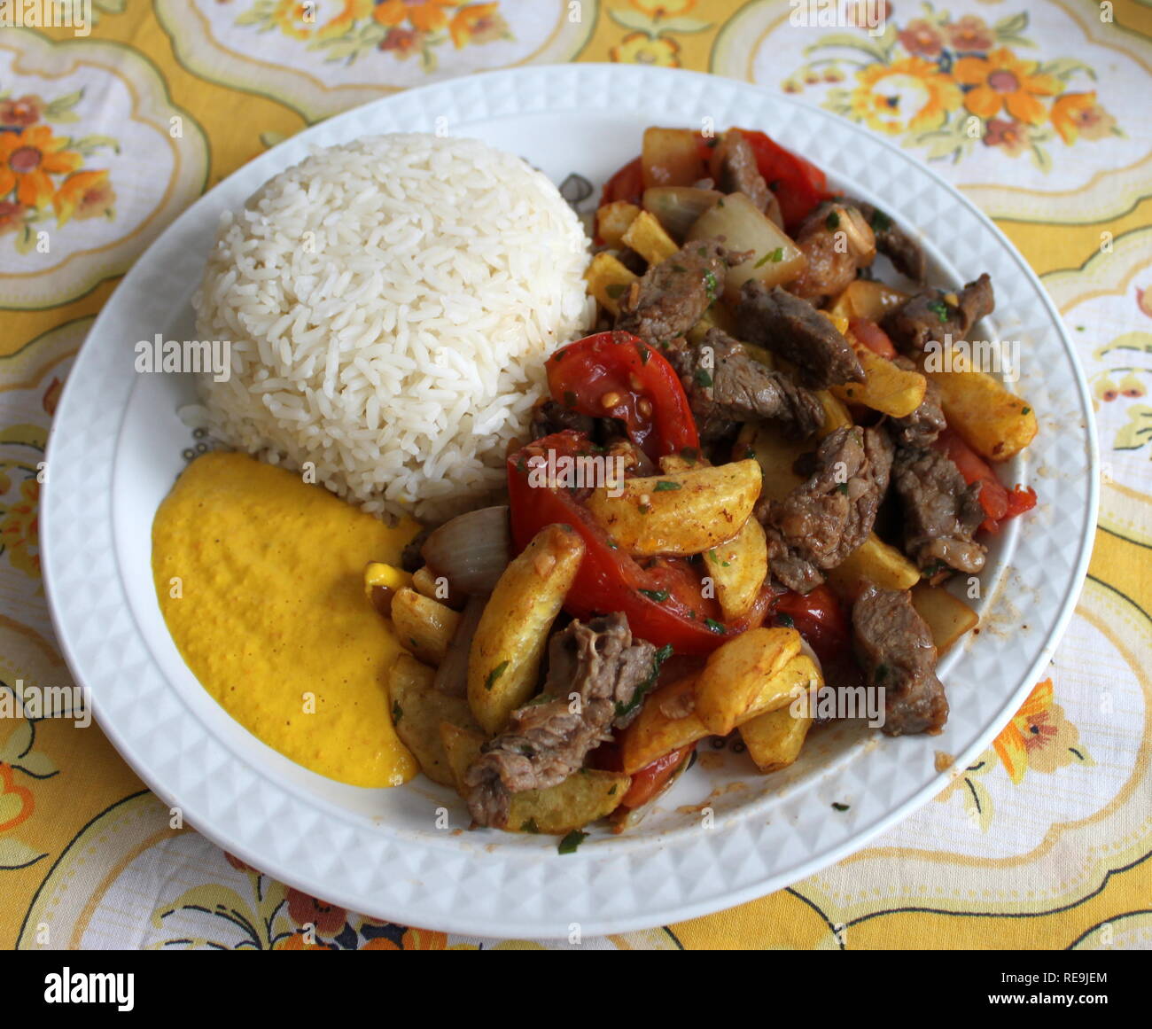 Lomo saltado piatto Peruviano Foto Stock