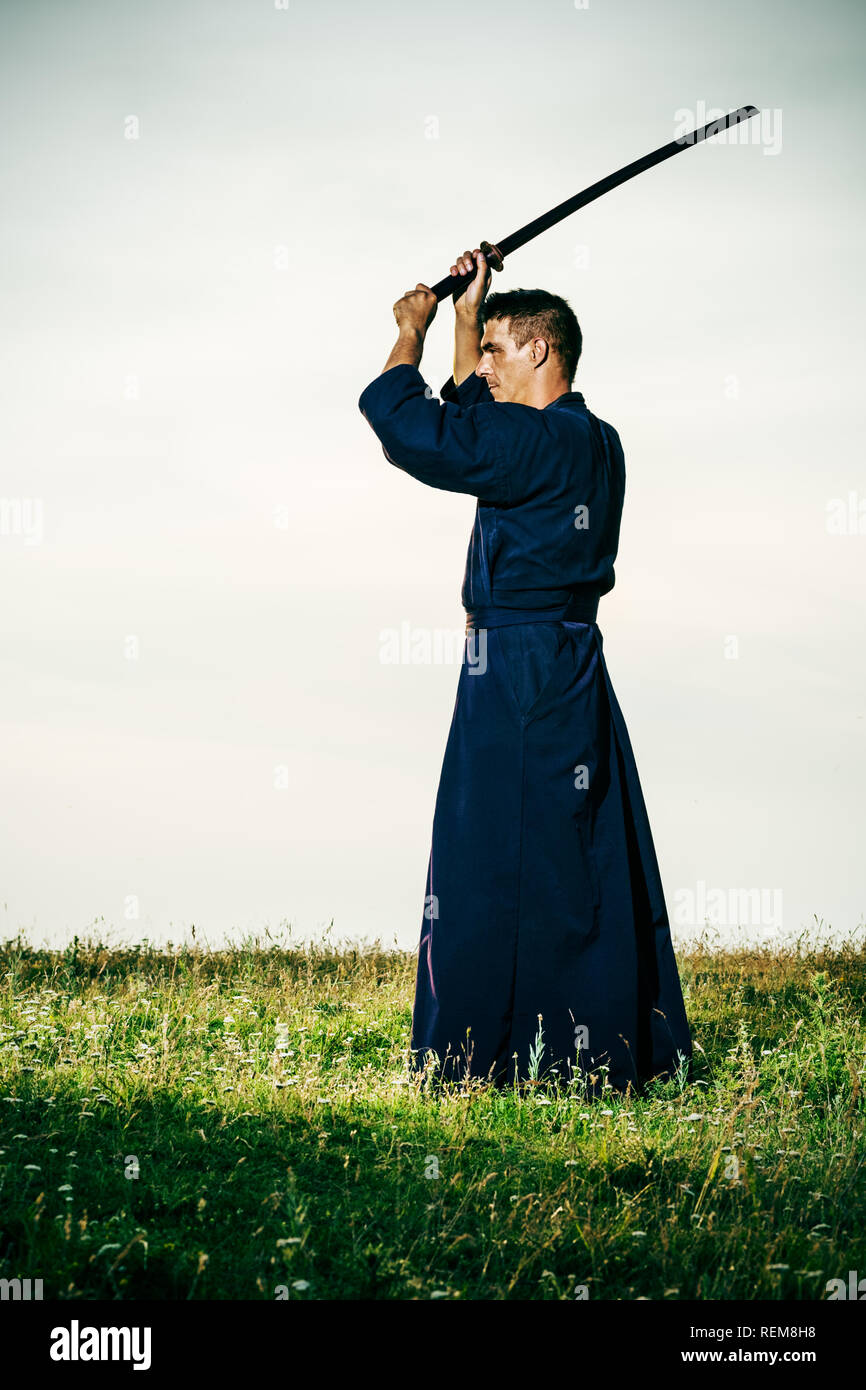 Kendo fighter holding bokuto Foto Stock