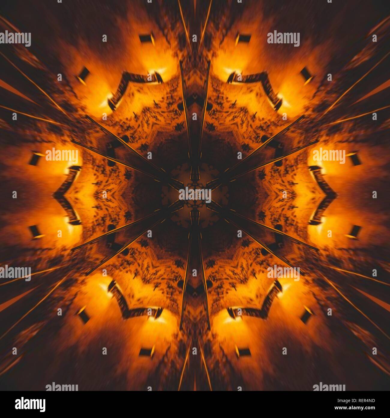 Immagine grafica con caleidoscopio stile design abstract colori caldi Foto Stock