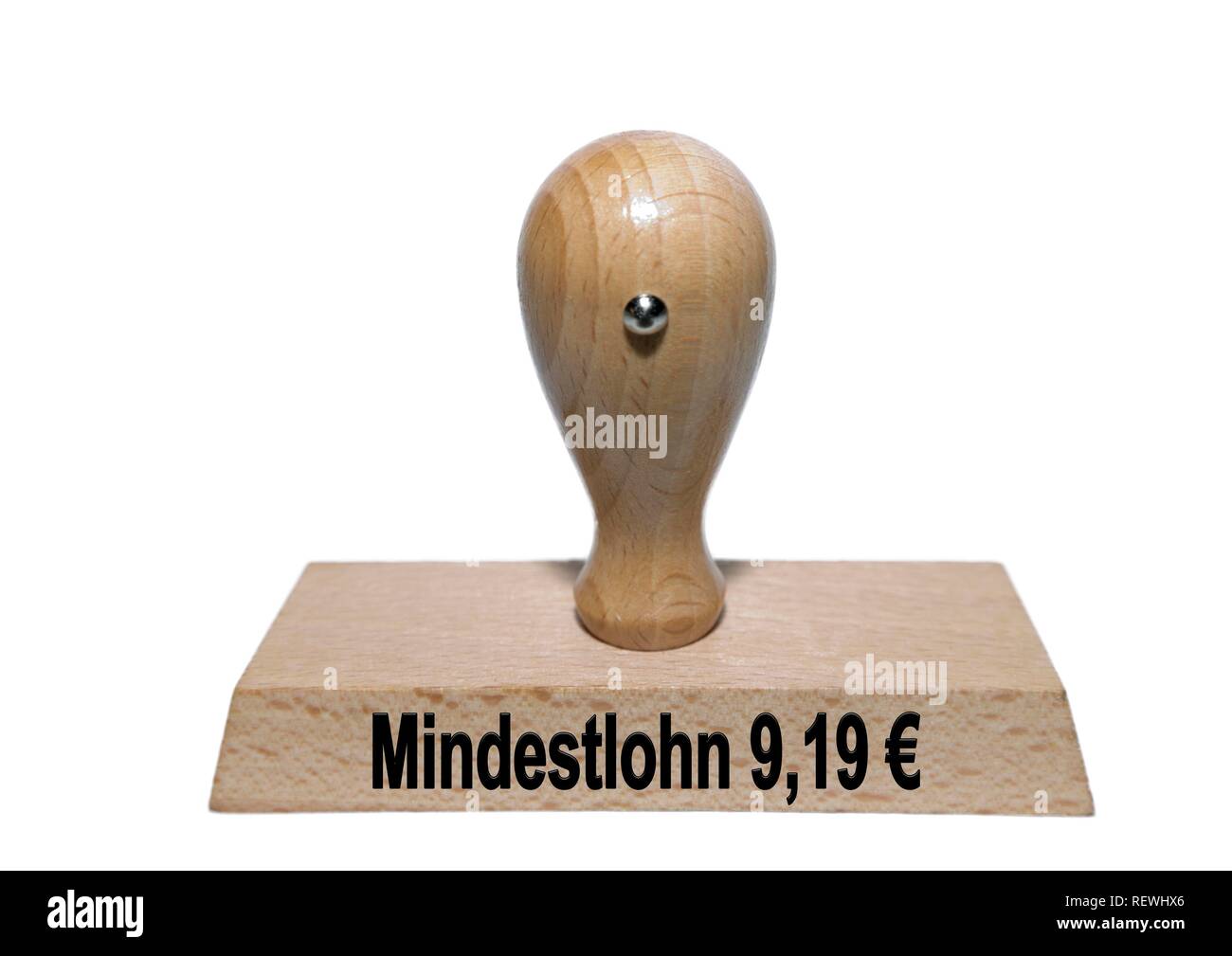 Immagine di simbolo, timbro con iscrizione salario minimo 9,19€, intaglio, Germania Foto Stock