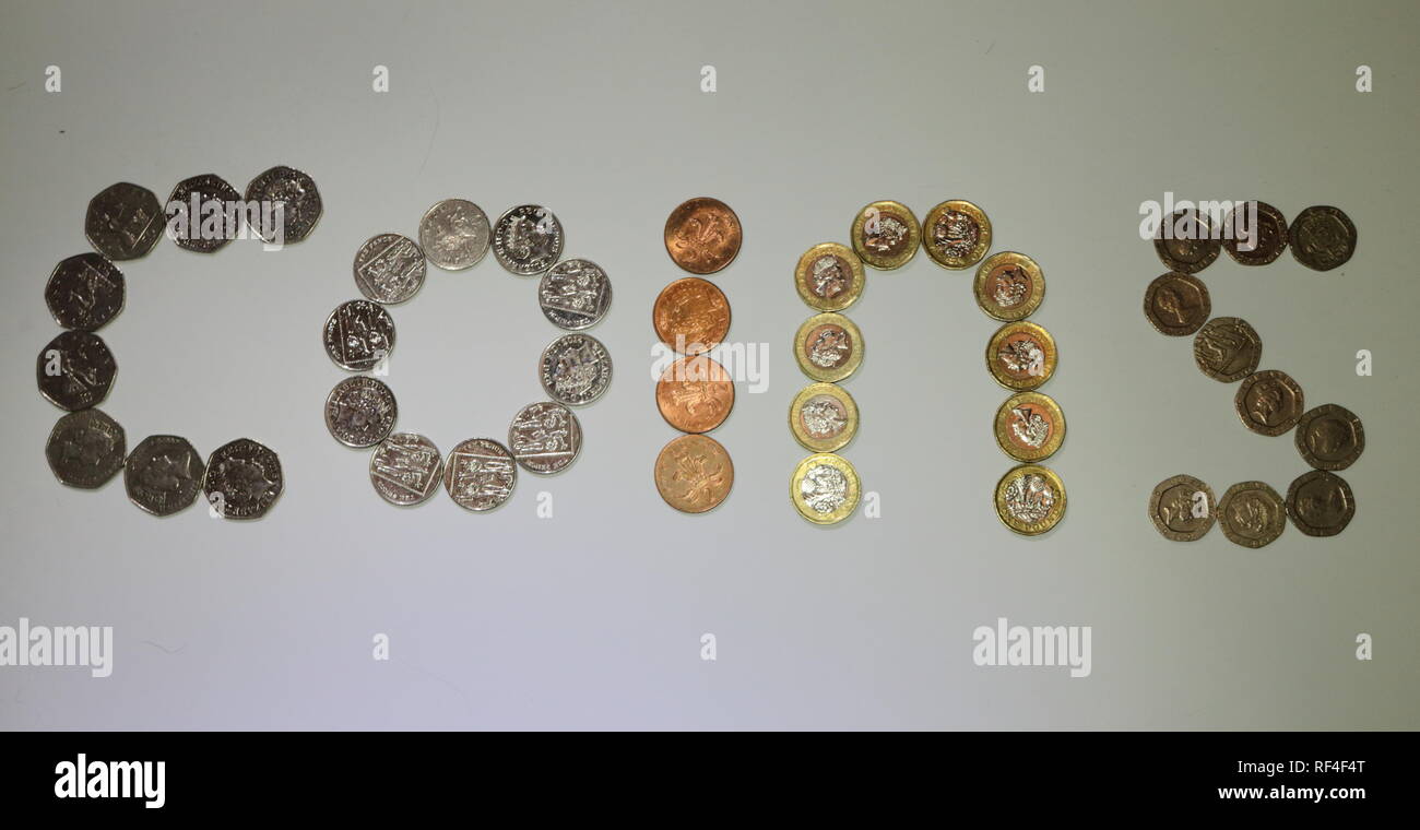 Valuta Sterlina monete stabiliti per scrivere la parola delle monete in euro Foto Stock