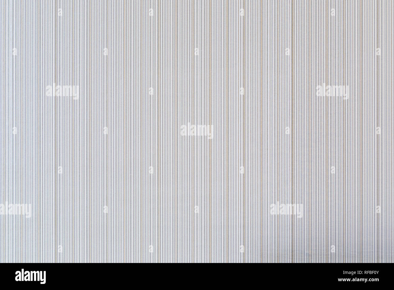 Alta risoluzione full frame sullo sfondo di un pallido e beige carta da parati a strisce. Foto Stock