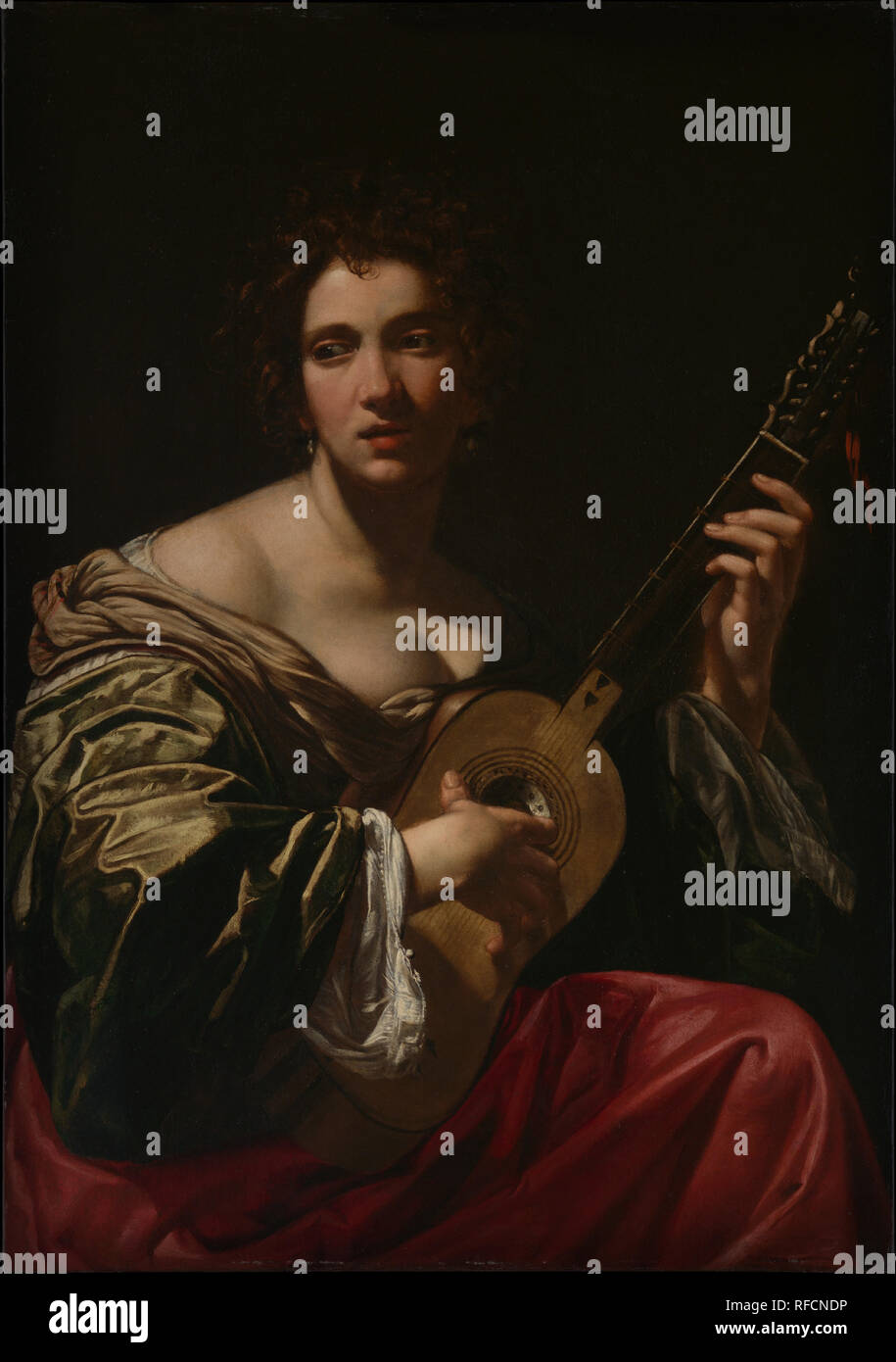 Donna di suonare una chitarra. Artista: Simon Vouet (francese, Parigi  Parigi 1590-1649). Dimensioni: 42 × 29 7/8 in. (106,5 × 75,8 cm). Data: ca.  1618. Questo seducente rappresentazione di una donna di