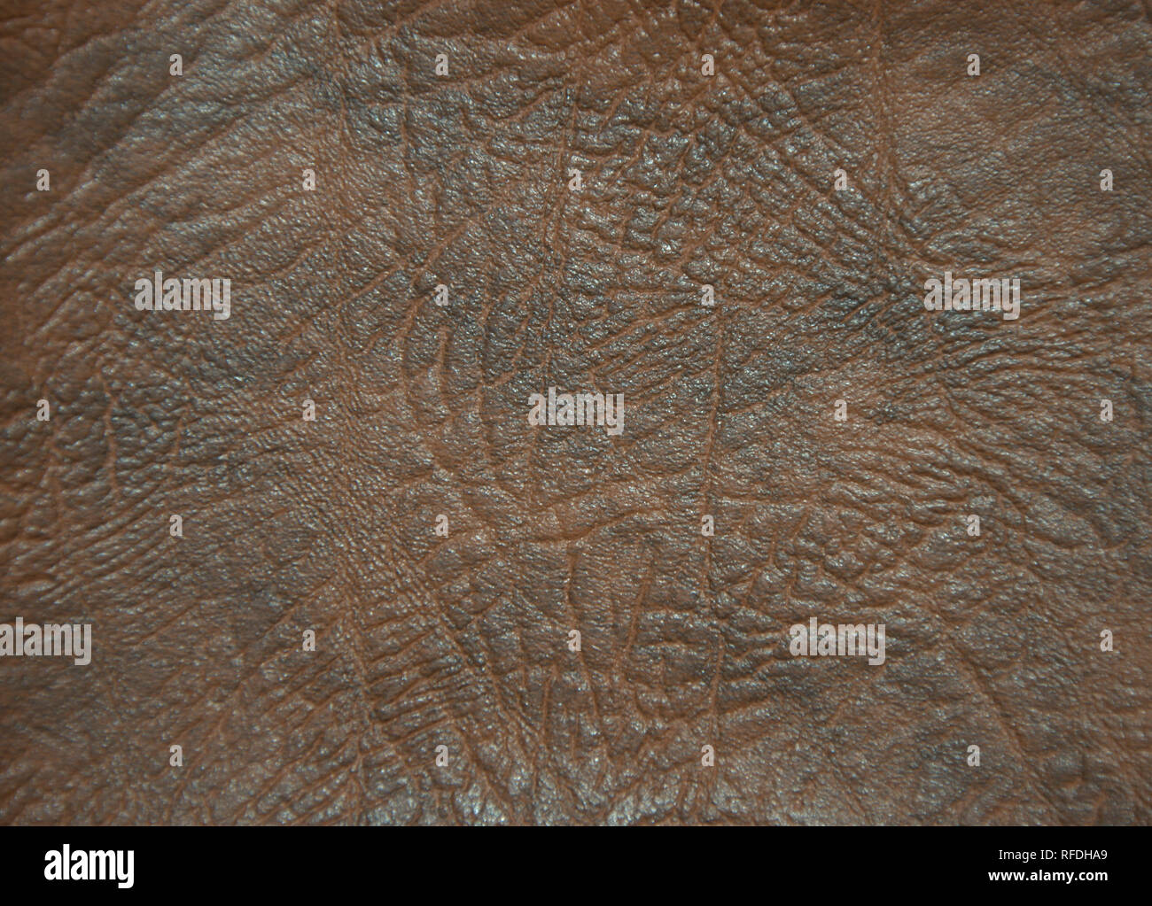 Superficie decorativa imitando artificialmente realizzata in pelle. La foto è stata scattata nelle ore diurne, primo piano. Foto Stock