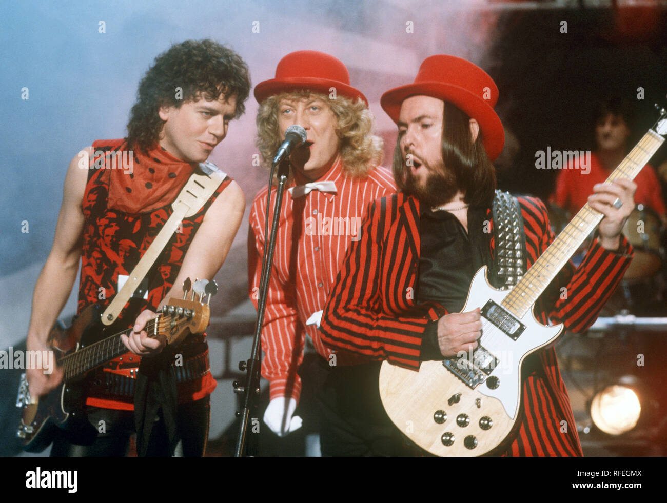 Band britannica Slade il 9 febbraio 1985 a Monaco di Baviera. (L-r): Jim Lea, Noddy titolare, Dave Hill e Don Powell (tamburi). | Utilizzo di tutto il mondo Foto Stock