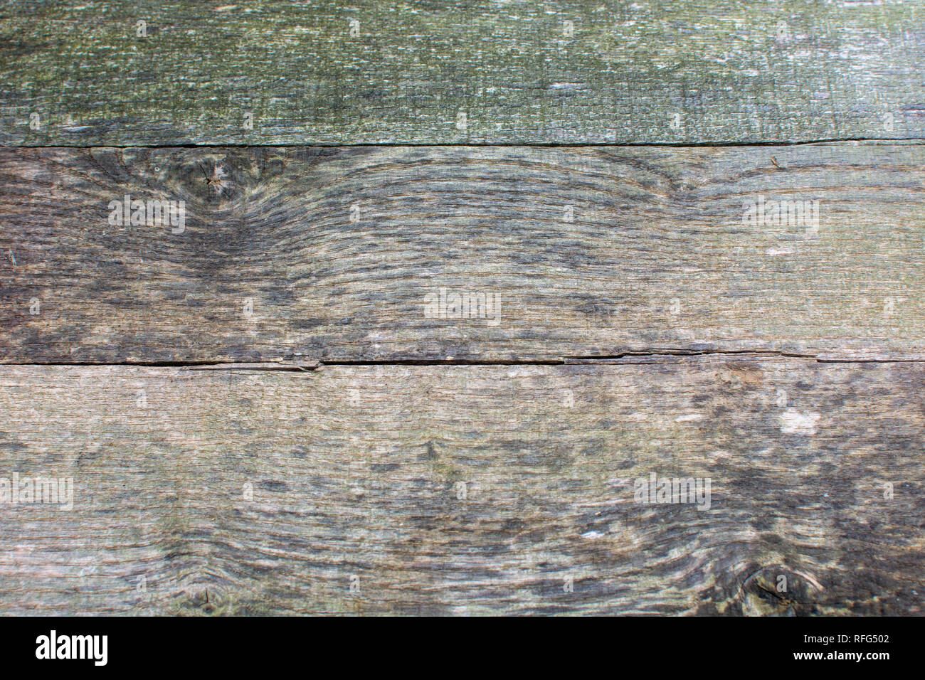 Weathered pallet di pannelli di legno allineate orizzontalmente. Foto Stock