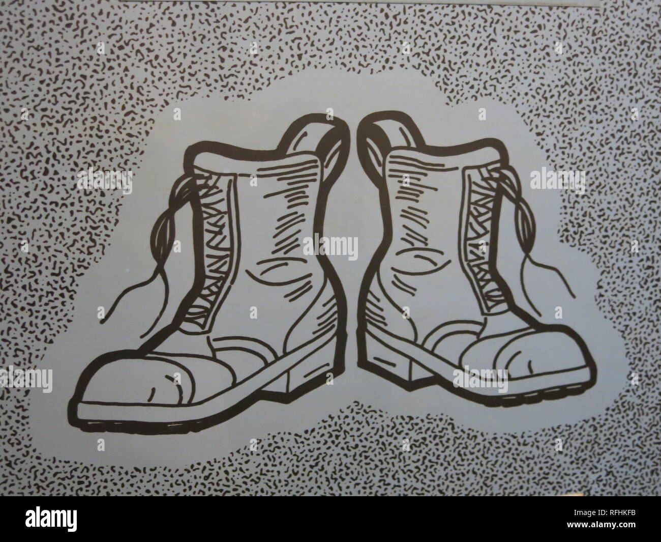 Bianco & Nero disegno della linea di operaio's stivali in mostra presso la Manor House Museum di boot e scarpa scambi nel Northamptonshire Foto Stock