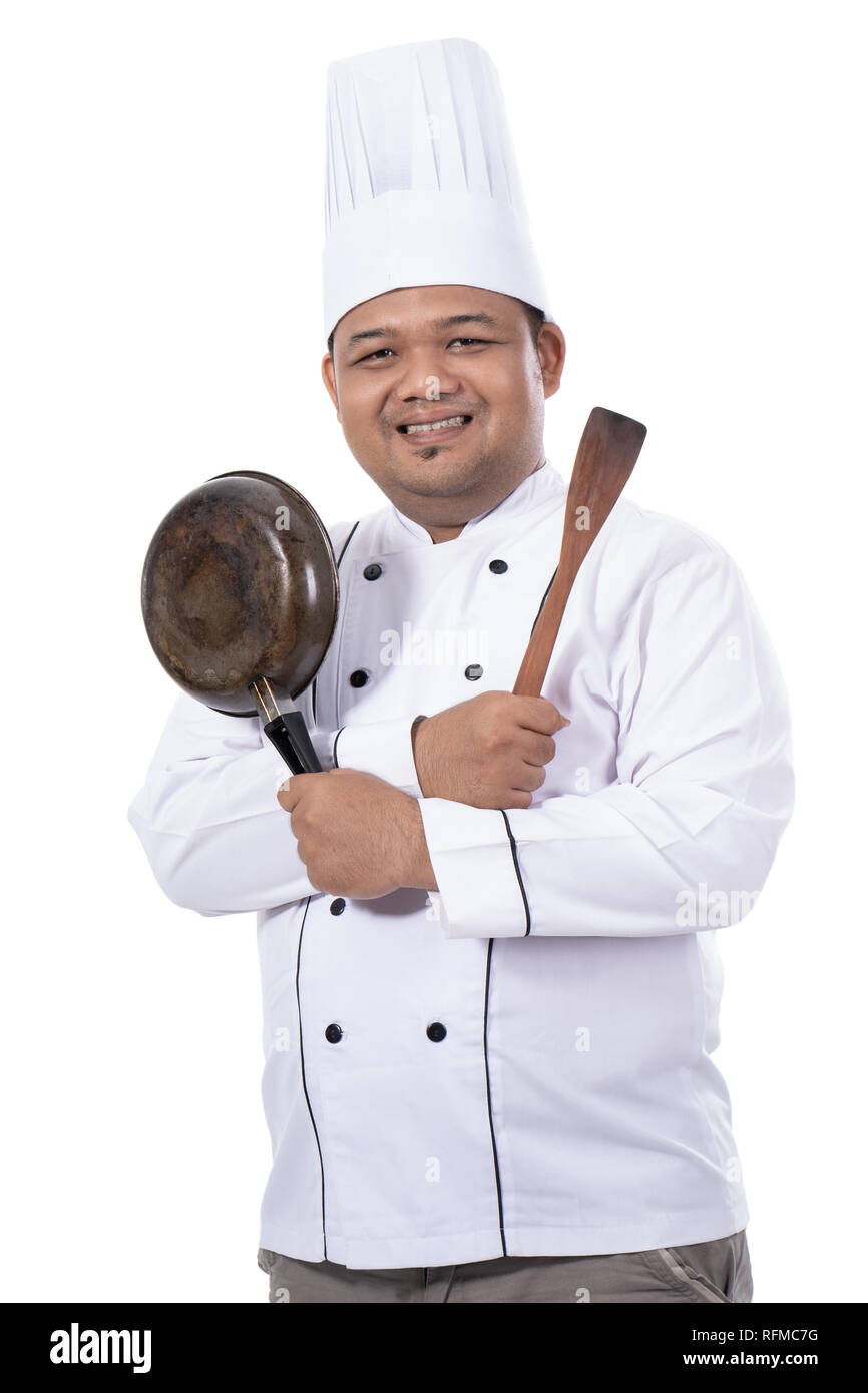 Ritratto di master chef rappresentano due mani incrociate con pan e la spatola Foto Stock