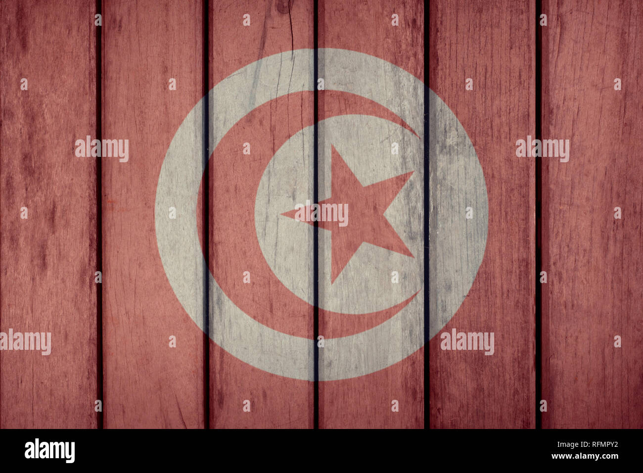 Politica Tunisia News Concept: bandiera Tunisina recinzione di legno Foto Stock