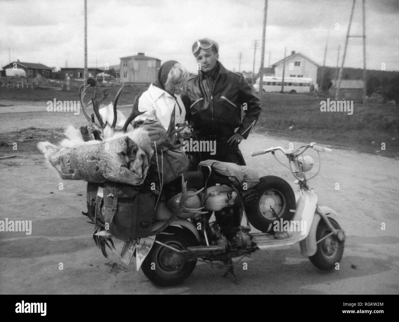 Motociclo turismo in Lapponia, 1958 Foto Stock