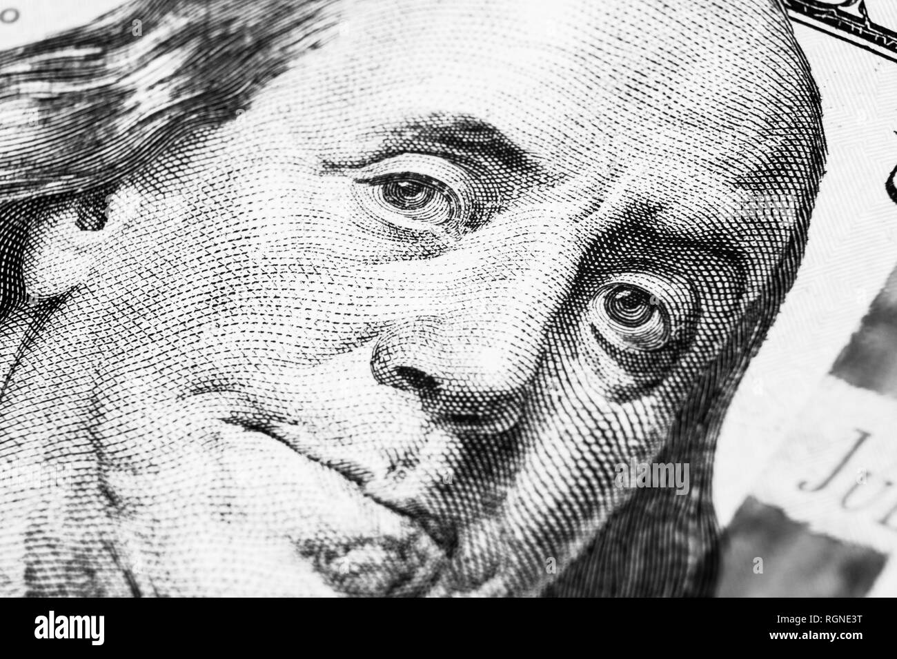 Vista ravvicinata Ritratto di Benjamin Franklin su un centinaio di dollari. Sfondo del denaro. 100 dollari con Benjamin Franklin occhi macro Foto Stock