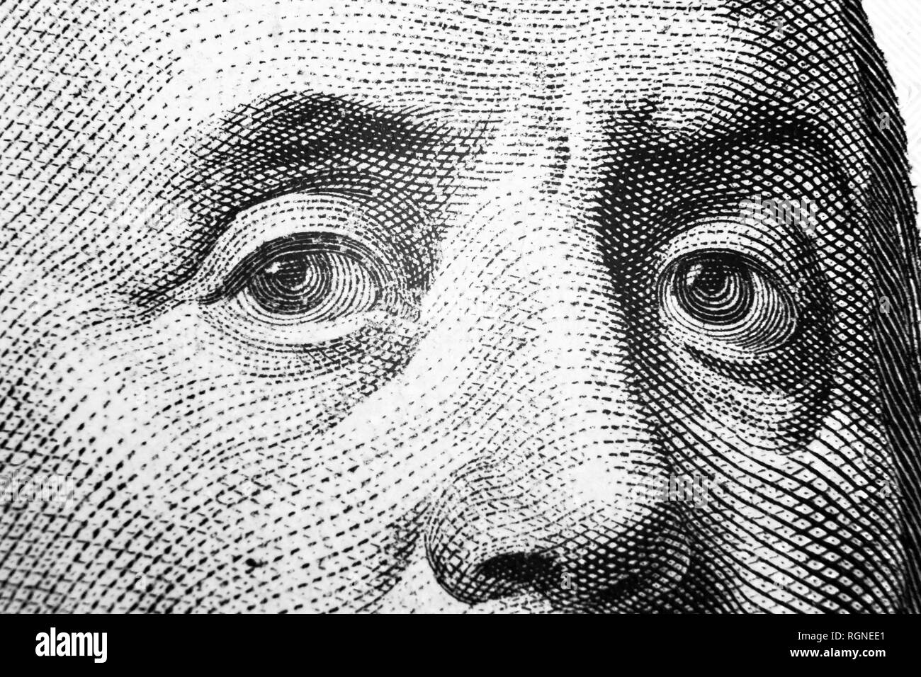 Vista ravvicinata Ritratto di Benjamin Franklin su un centinaio di dollari. Sfondo del denaro. 100 dollari con Benjamin Franklin occhi macro Foto Stock