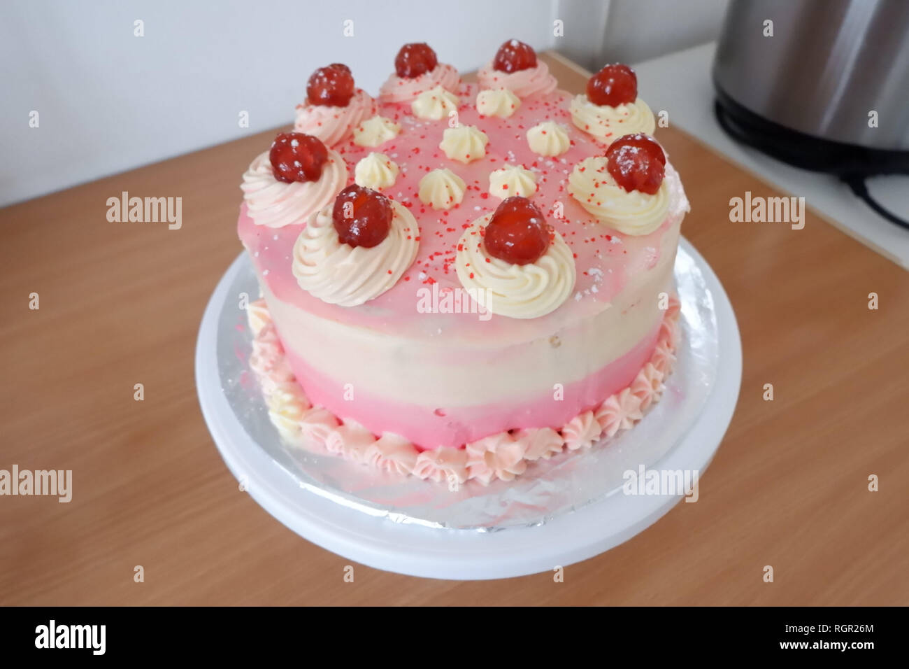 Rosa grazioso torta di compleanno Foto Stock