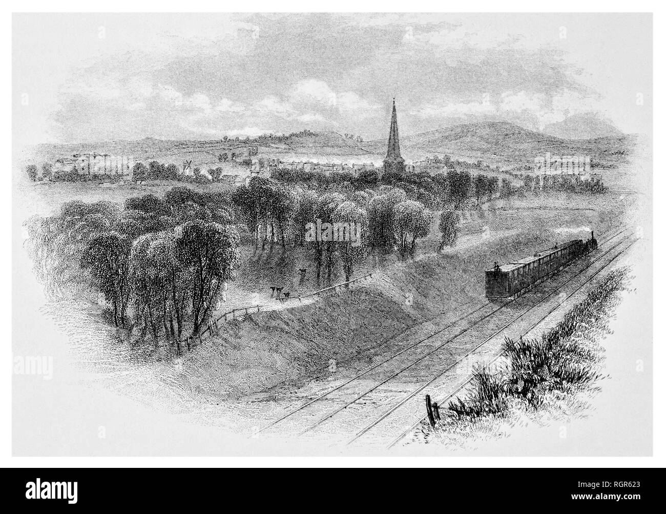 Leighton Buzzard paesaggio con treno a vapore e chiesa guglia Foto Stock