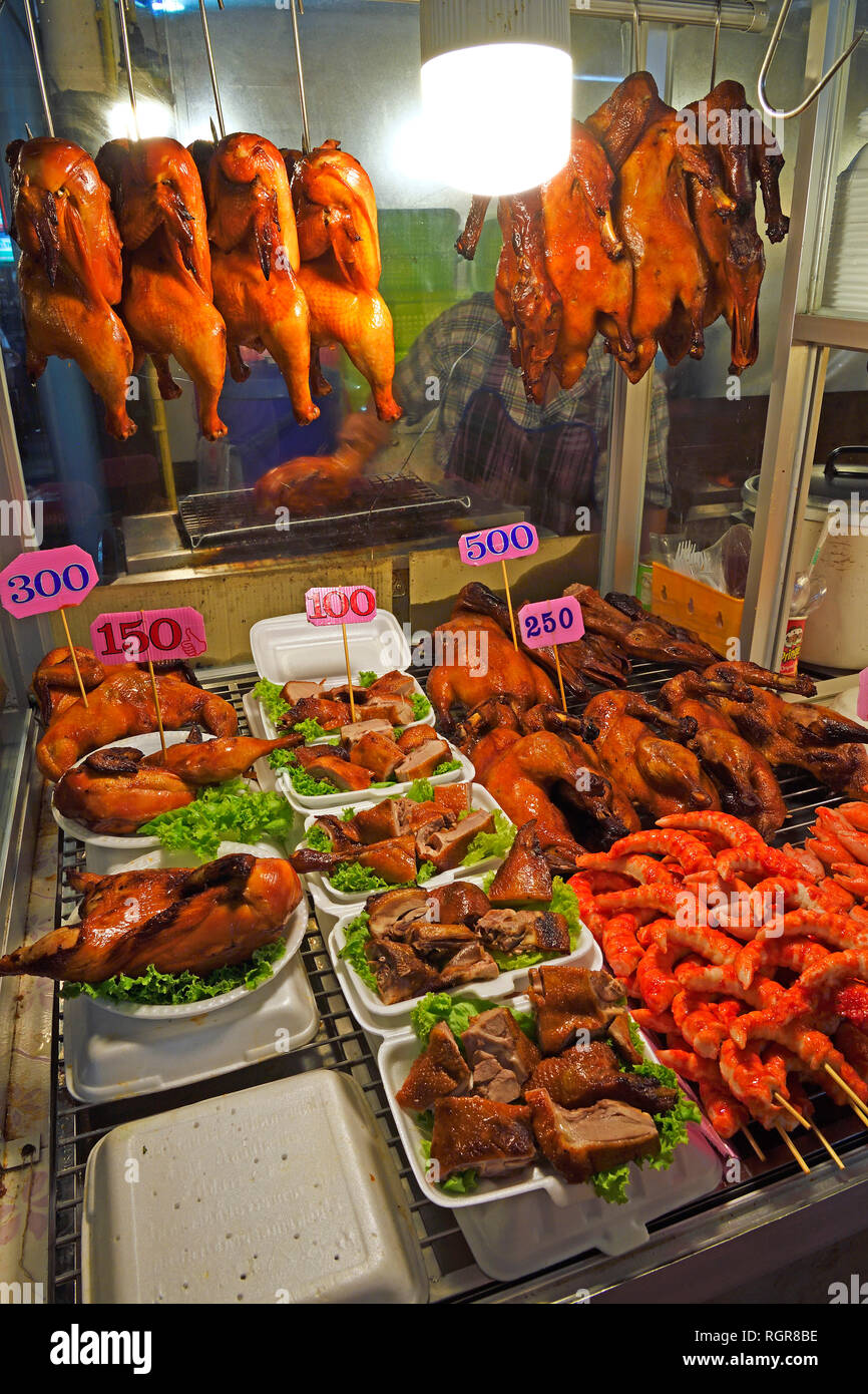 Pressione di stallo di cibo, il Mercato Notturno Patong Beach, Phuket, Tailandia Foto Stock