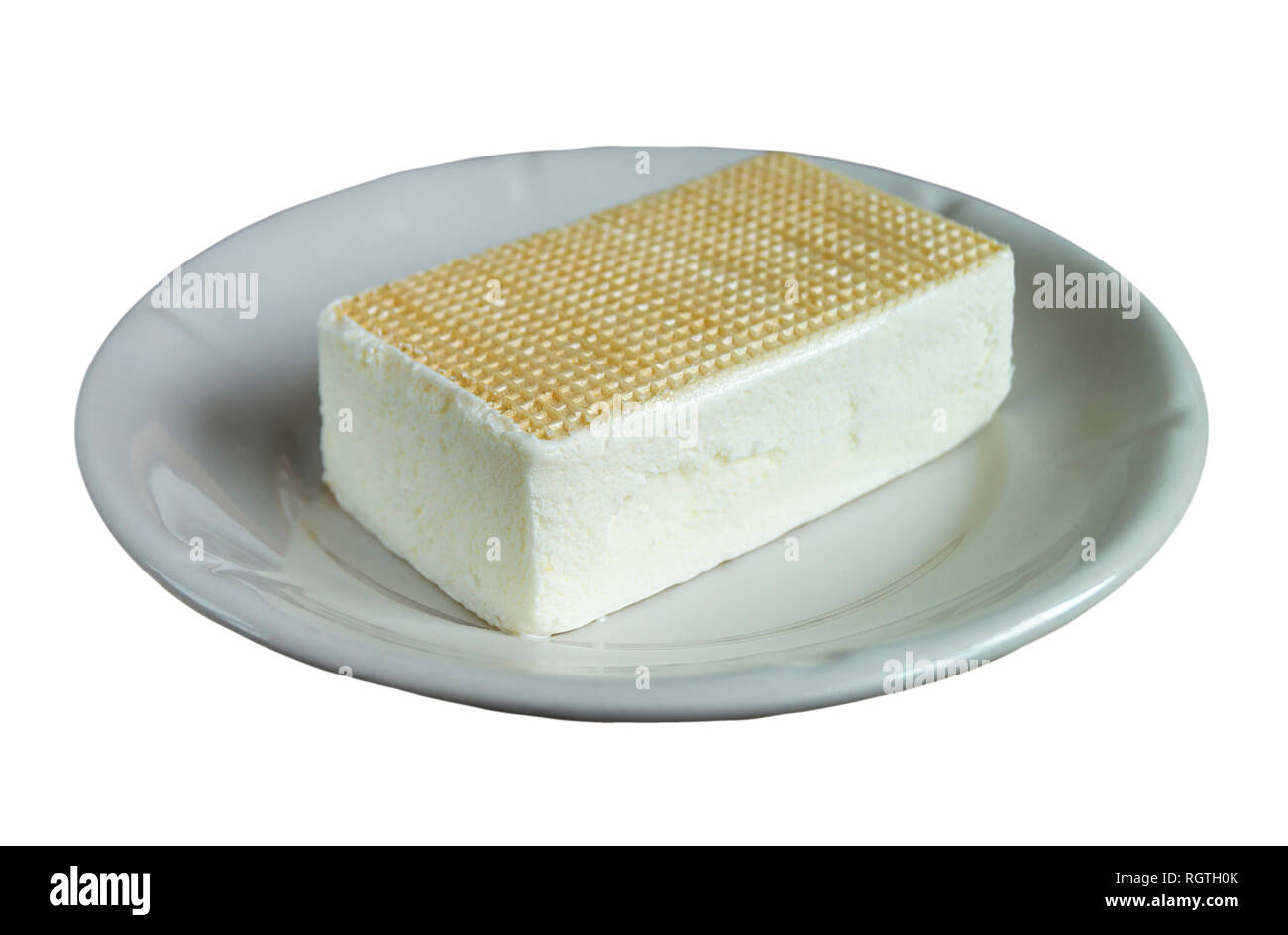 La Crema gelato di forma quadrata in guardia;mantenere isolato su sfondo bianco Foto Stock