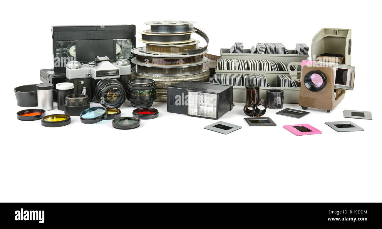Le apparecchiature obsolete per la fotografia e le riprese video e slide show isolati su sfondo bianco Foto Stock