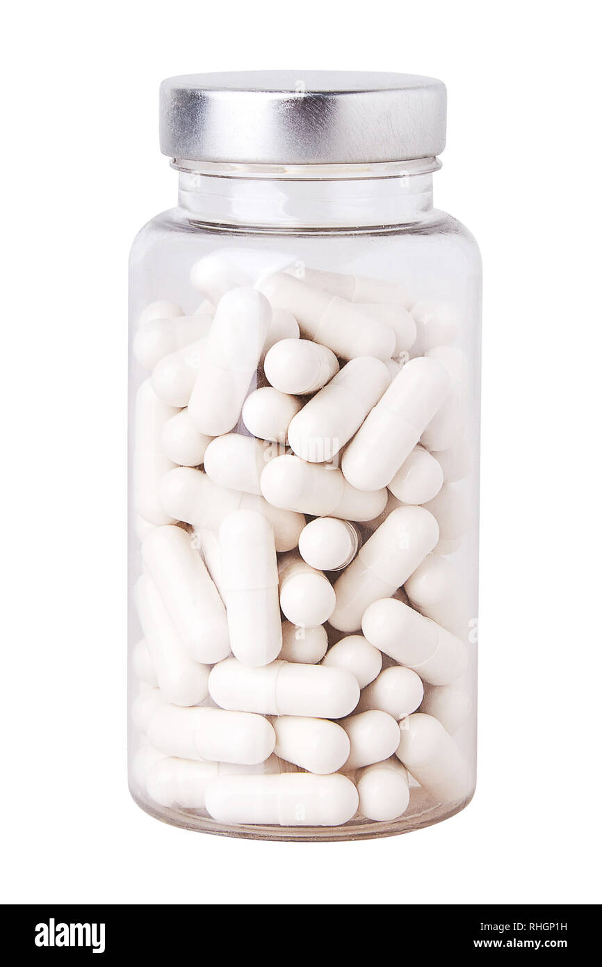 Le capsule di bianco in medio formato in plastica trasparente bottiglia isolato su sfondo bianco. Natural health supplement. Luci dello studio Foto Stock